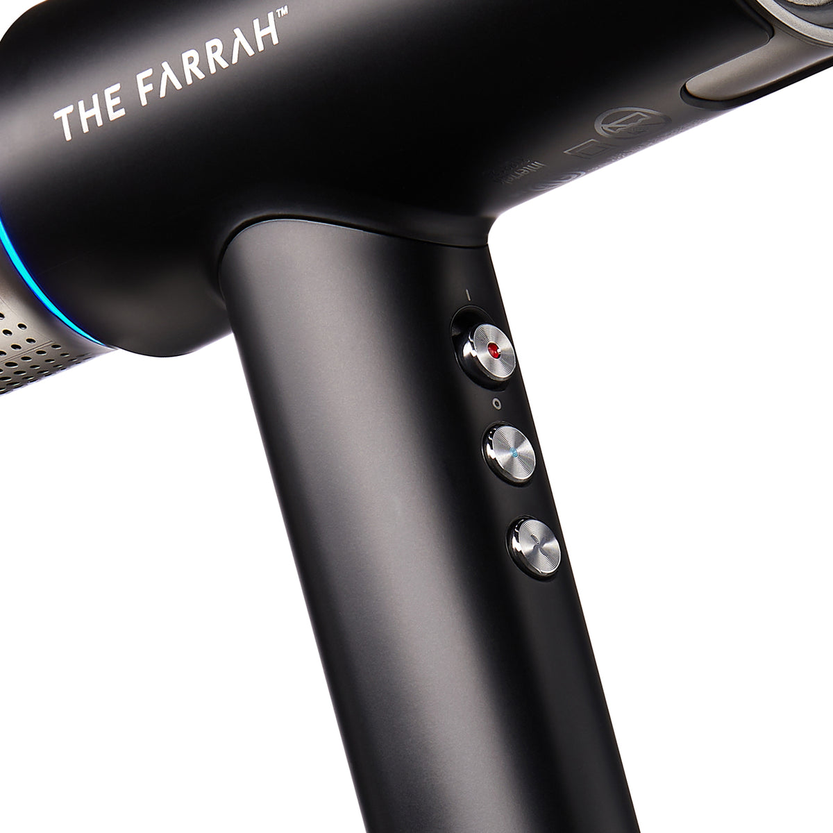closeup view of the buttons on handle of black farrah airpulse dryer 